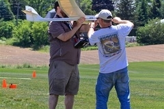 Rob assists Adam with launch preparations.